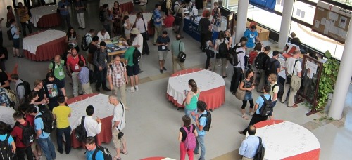 A picture taken at the UseR!2013 conference of attendees during a coffee break